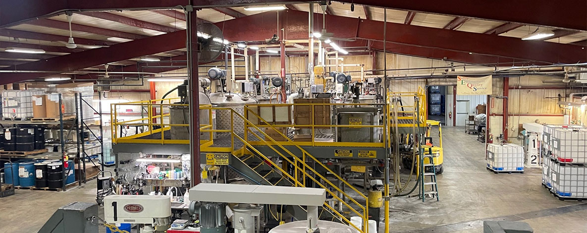 Paradigm Labs St. Gabriel Louisiana manufacturing floor with mixing tanks and totes