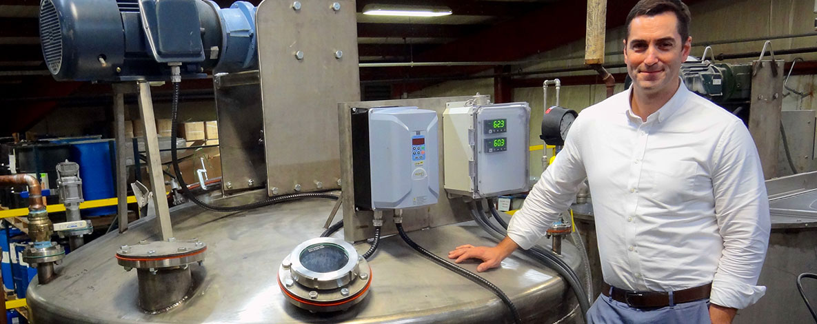 Brendan K. Maier, President of Paradigm Labs, on the manufacturing floor